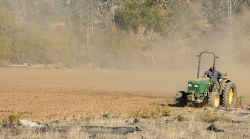 Tractor Working in Field
