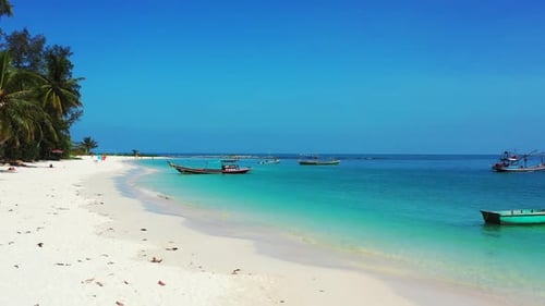 Aerial drone view landscape of luxury sea view beach voyage by blue ocean and white sandy background