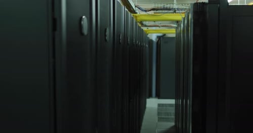 Row of computer servers and corridor in tech room