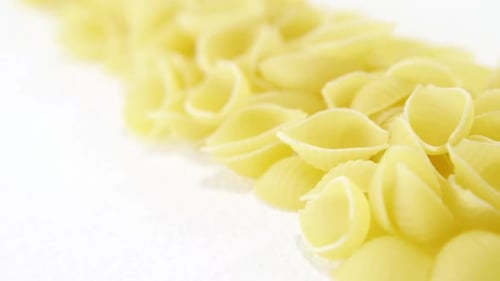 Close Up of Shell Pasta on White Surface