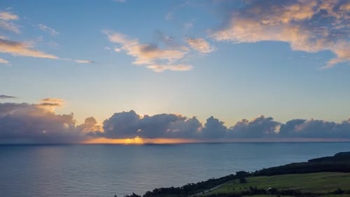 Radiant Sunrise Over the Ocean From Above