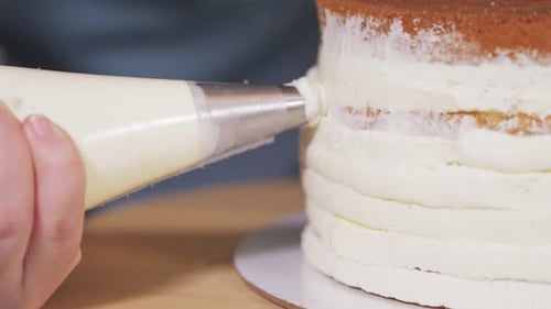 Decorating Cake With White Frosting