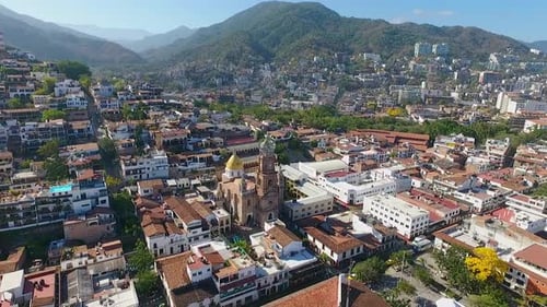 Stunning Aerial View of Coastal City with Cathedral
