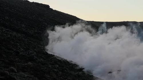 Man Emerging From Smoke Of Lava Flow From Erupting Fagradalsfjall Volcano