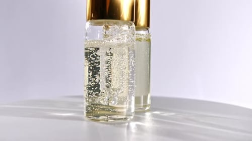 Luxury Serums in Glass Bottles with Gold Caps
