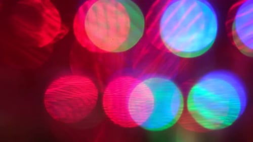 Moving bokeh lights pink abstract slow motion animation.