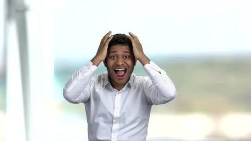 Man Celebrating Success With Joyful Expressions