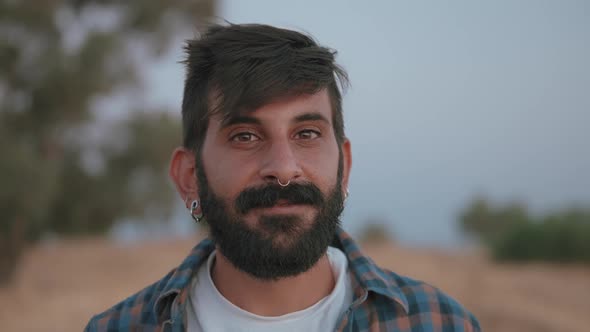 Cover for Portrait of a confident bearded smiling