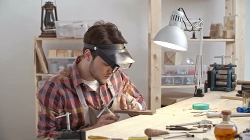 Man Using Jewelry Saw