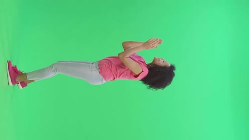 Woman Using Mobile Device on Green Screen Background