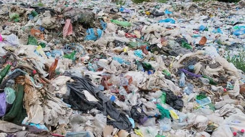 Environmental Pollution: Large Pile of Trash and Waste