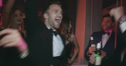 Elegant Party Celebration with Dancing and Drinks