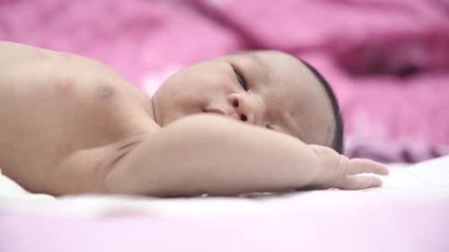 Newborn Baby Close Up Lying on Back