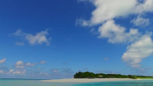 Wide angle nature of tropical island beach by blue ocean with sand background near palms