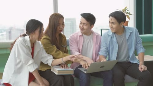 Group of young college friends studying together for their semester exams, discuss topics, Education