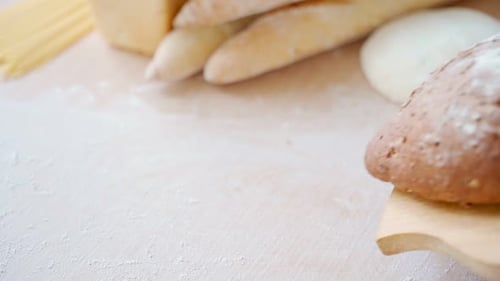 Fresh Loaf of Brown Bread on Wooden Board