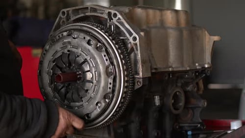 Mechanic Working on an Engine Close Up