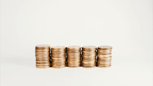 Stacks of Coins Building Up