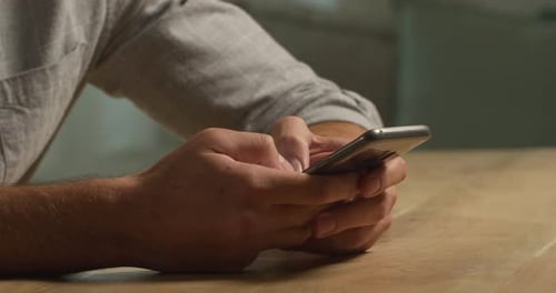 Caucasian man using his phone