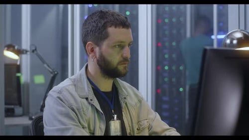 Young Man Working in Data Center