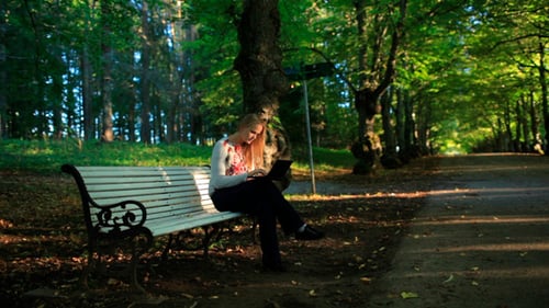 Young Woman With Laptop in the Park 2