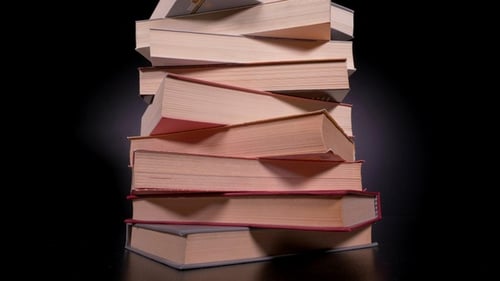 Stack of Books on a Black Background
