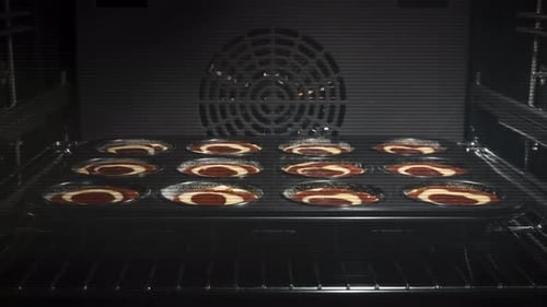 Cupcakes Baking Inside an Oven