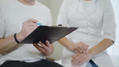 Doctor and Patient Discussing Medical Information