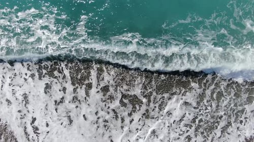 Foamy Clear Waves Rolling on Pebbles. Top View of Mediterranean Sea Water on Pebble Beach. Sea Shore