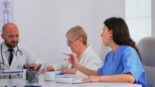 Medical Team Meeting in Modern Office