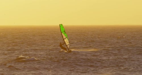 Male Surfer Windsurfing in The Beach 4k