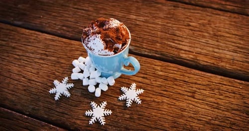 Hot Chocolate Delight with Marshmallows and Snowflakes