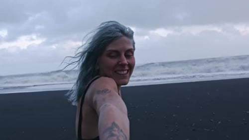 Smiling Tattooed Blue Haired Girl On Beach