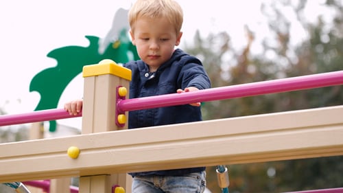 Boy on Playground Equipment 2