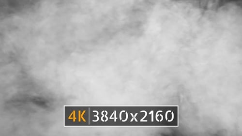 White Smoke Clouds Billow Against Dark Gray Background