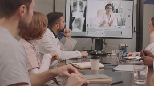 Medical Team in Video Conference Discussing X-Rays