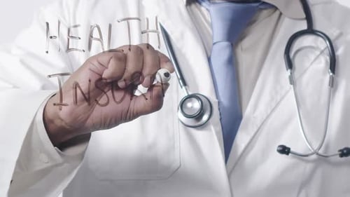 Doctor Writes Health Insurance on Clear Surface