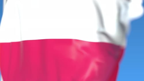 Realistic Waving Flag of Poland against Blue Sky