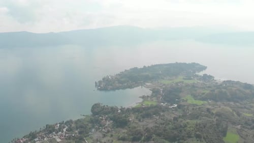 Aerial: lake Toba and Samosir Island from above Sumatra Indonesia.