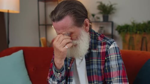 Upset Disappointed Senior Grandfather Wipes Tears and Cries From Despair Unrequited Love Problems