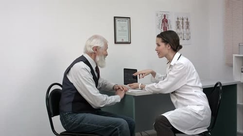 Doctor Explains Test Results to Senior Man