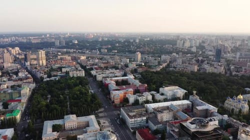 Aerial view of a beautiful and cozy evening city with narrow streets