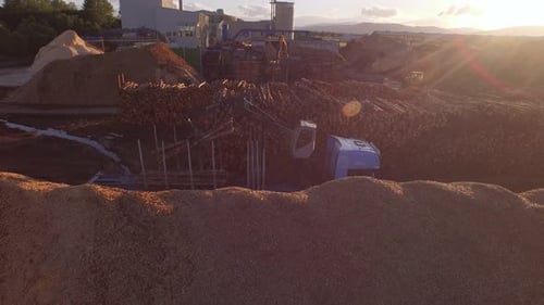 Forestry and logging operations taking place in the highlands of Scotland using large industrial mac