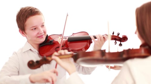 Children Playing Violins in Bright Studio
