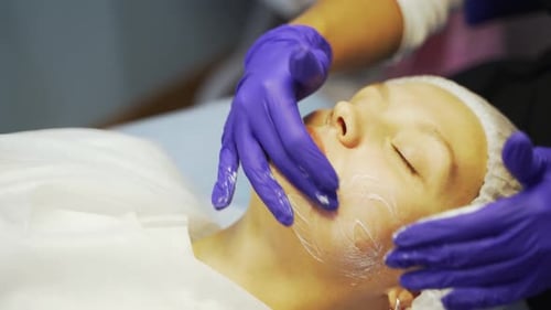 Young Adult Receives a Facial at a Clinic