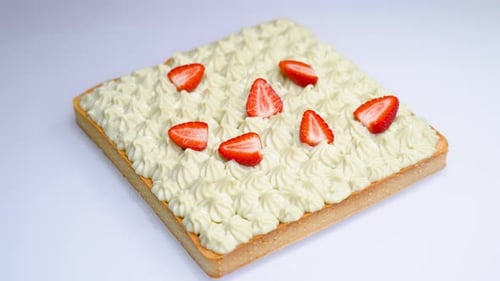Strawberries Put on a Cake with Cream