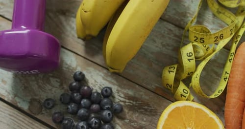 Fitness Still Life with Fruits, Vegetables, Dumbbell