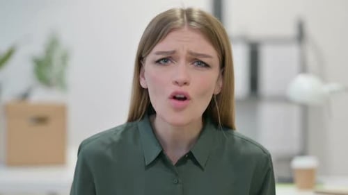 Woman Arguing and Expressing Anger Indoors
