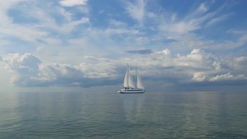 Weißes Segel im Meer