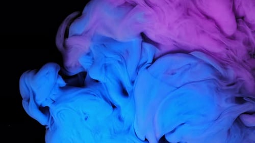 Blue and Purple Ink Swirl on Black Background